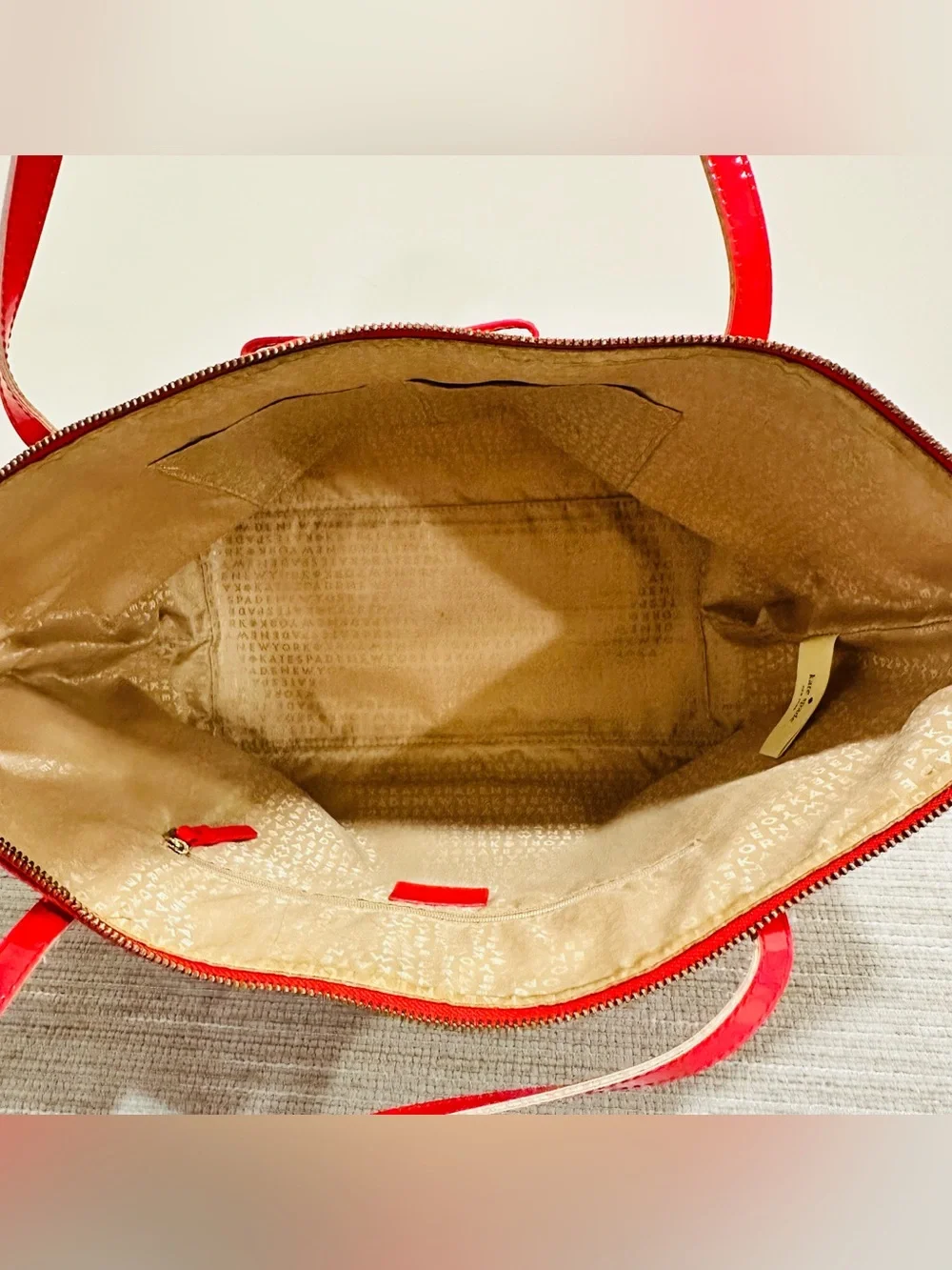 Kate Spade New York Large Red Vinyl Circle Pattern Tote Bag